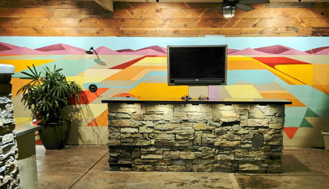 Outdoor bar with mural